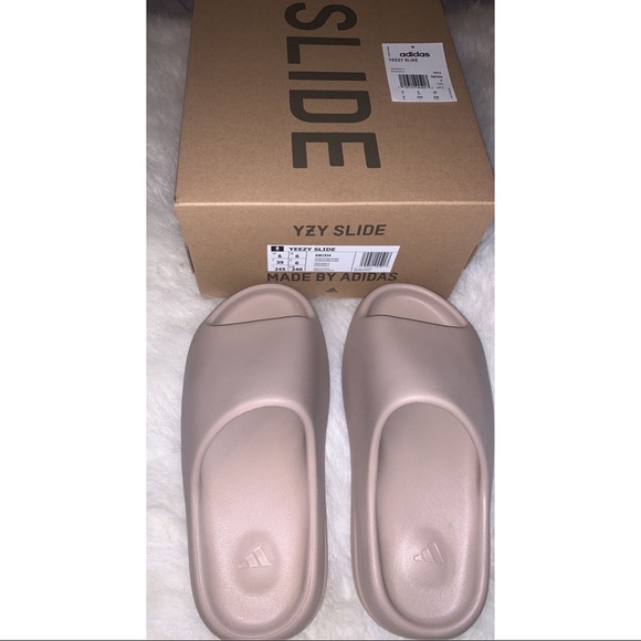 YEEZY SLIDE ADULTS “PURE”
Color: Beige 
Size: 6 (MENS) 7(WOMENS) - Picture 3 of 4
